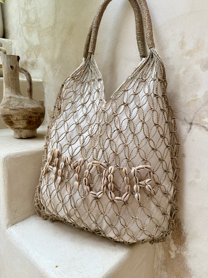 Sac à main en fibres naturelles tressées – messages en coquillages cauris au choix